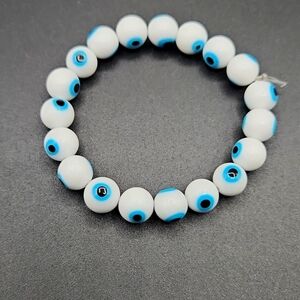 By Krafty_Korner Handcrafted beaded bracelet made with white glass beads